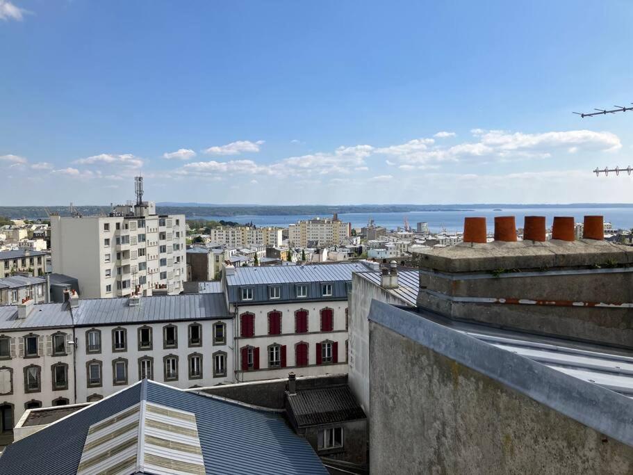 a view of a city with buildings and the ocean at Vue mer &#47; Jaurès-Centre-Ville &#47; Appart Lumineux in Brest