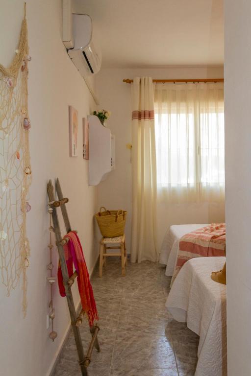 Posteľ alebo postele v izbe v ubytovaní Apartamento puerto de Jávea Esmeralda home