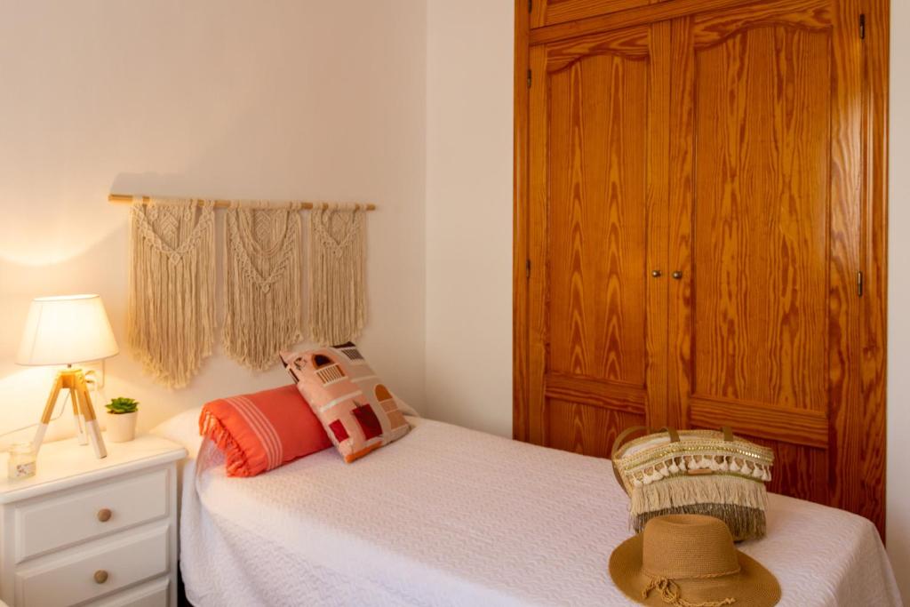 Posteľ alebo postele v izbe v ubytovaní Apartamento puerto de Jávea Esmeralda home
