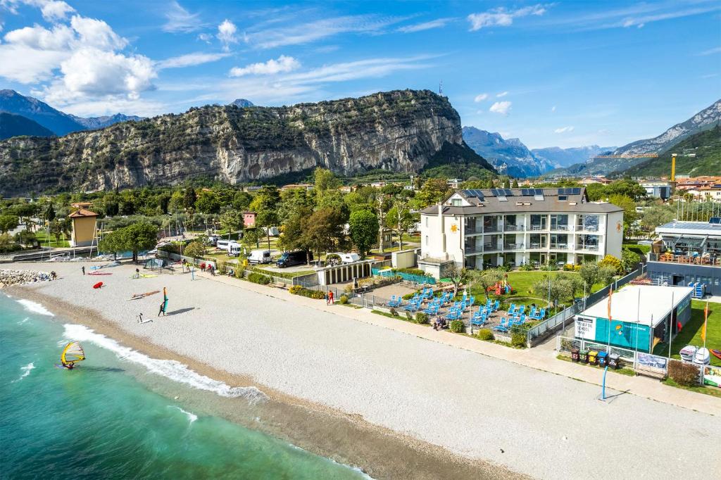 an aerial view of a beach with mountains in the background at Residence Casa al Sole Apartments in Nago-Torbole