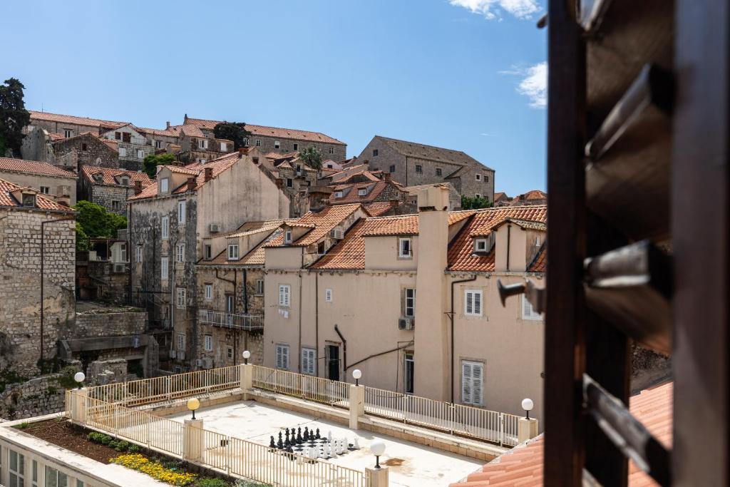 a view of the city from the roof of a building at Apartments and Rooms Lejletul in Dubrovnik
