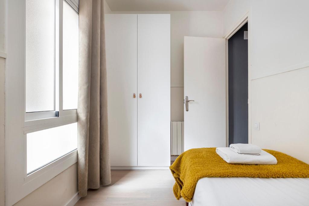 Posteľ alebo postele v izbe v ubytovaní Apartments Sata Sagrada Familia Area