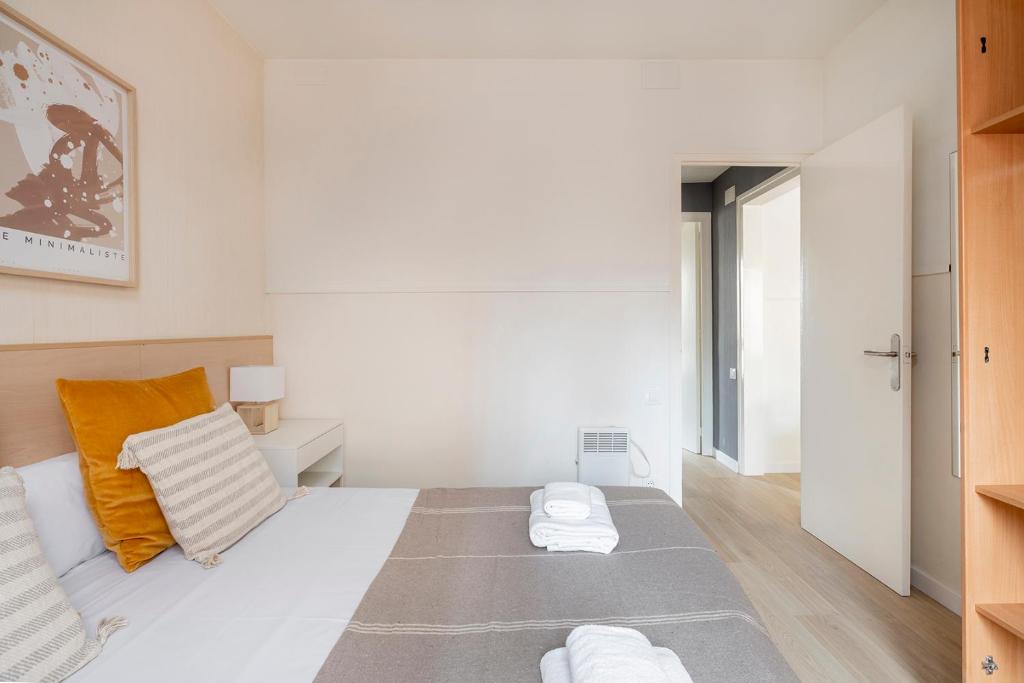 Posteľ alebo postele v izbe v ubytovaní Apartments Sata Sagrada Familia Area