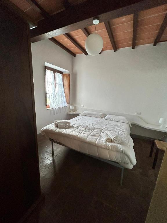 Postel nebo postele na pokoji v ubytování Residence San Francesco