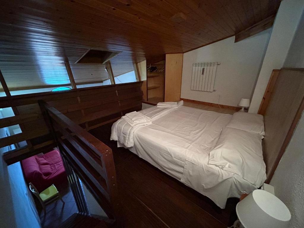 Postel nebo postele na pokoji v ubytování Residence San Francesco