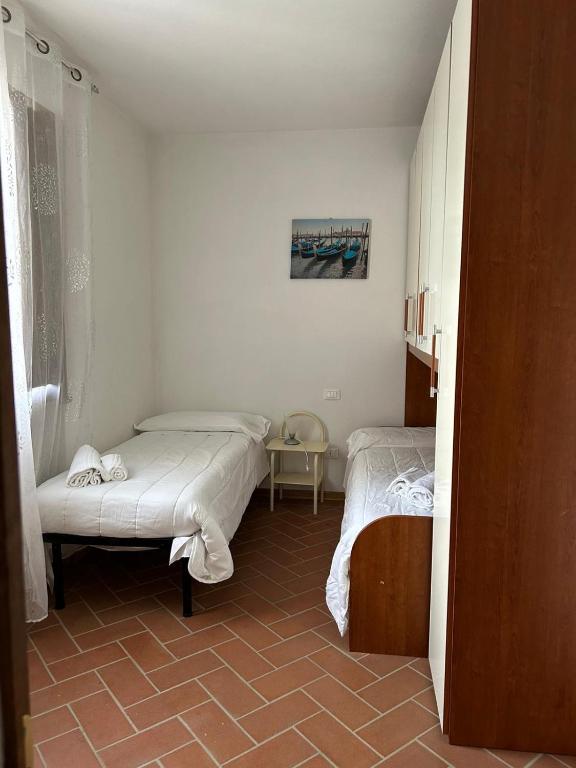 Postel nebo postele na pokoji v ubytování Residence San Francesco