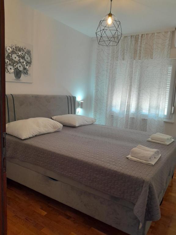 Postel nebo postele na pokoji v ubytování Apartmants Matić