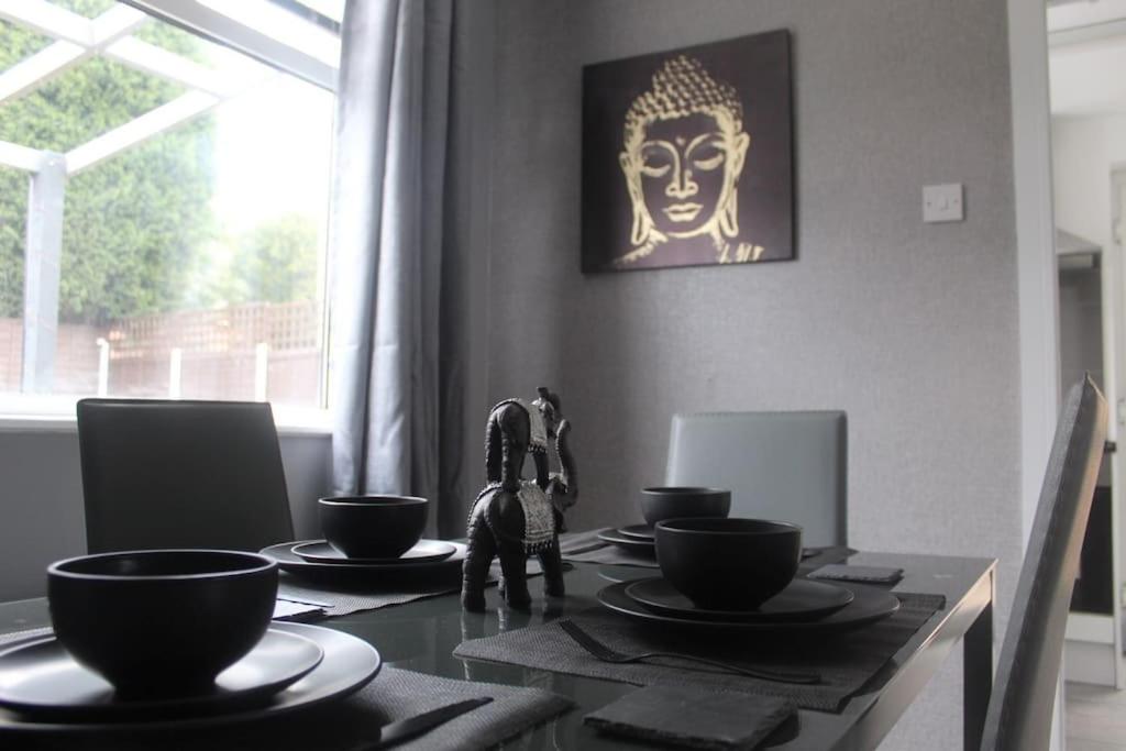 a dining room table with a horse figurine on it at West Midlands Contractors, Nurses and Families 