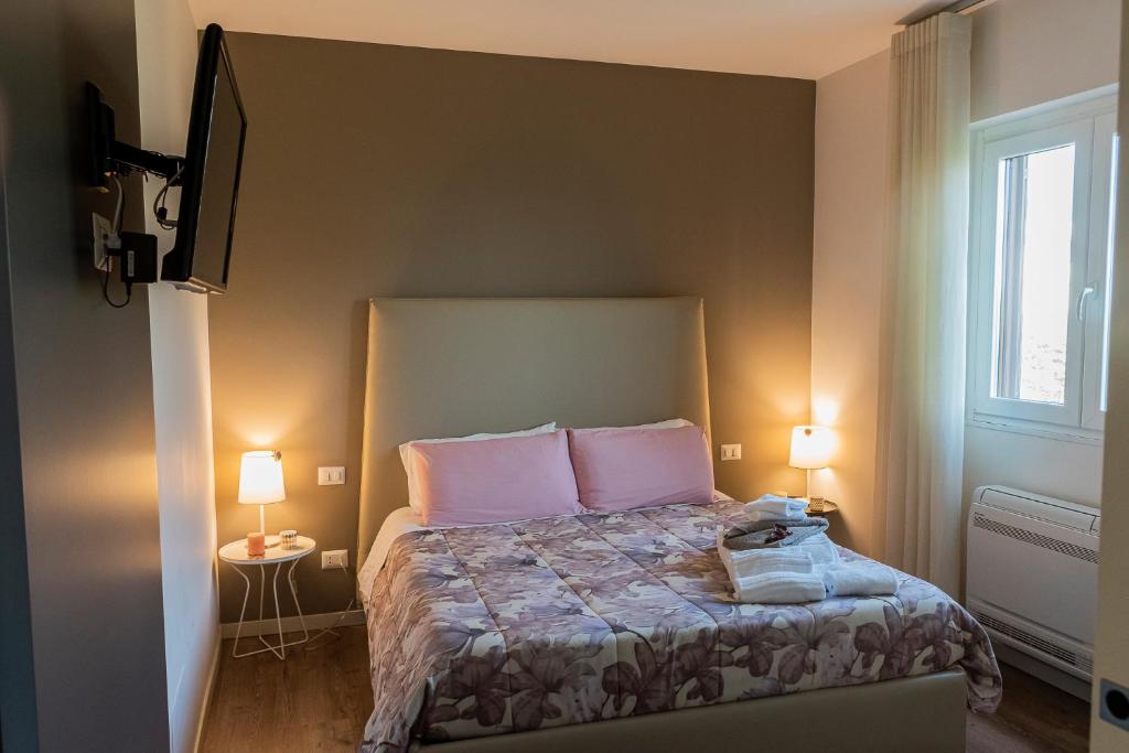 Postel nebo postele na pokoji v ubytování La Dimora Del Bue
