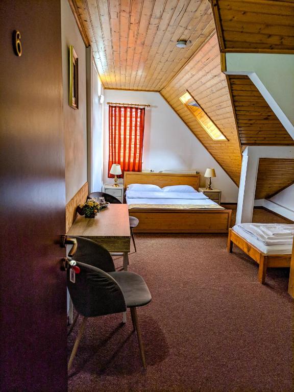 Postel nebo postele na pokoji v ubytování Pension Casa Samurai