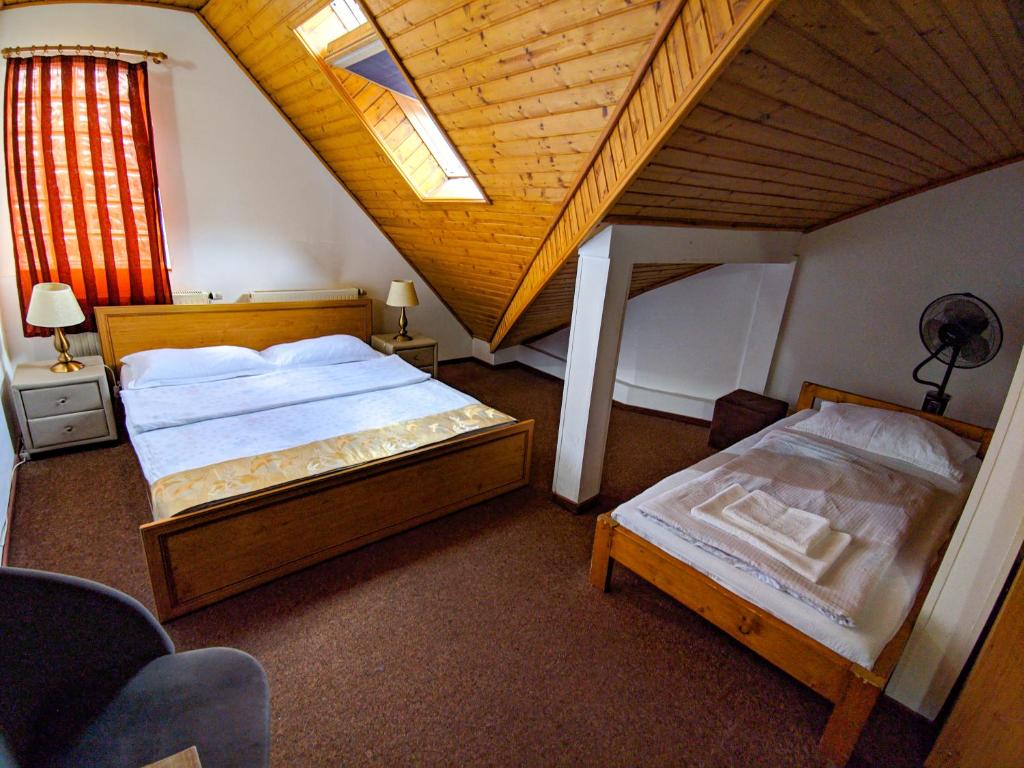 Postel nebo postele na pokoji v ubytování Pension Casa Samurai