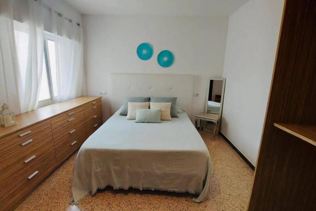 Posteľ alebo postele v izbe v ubytovaní Piso Grao de Gandía