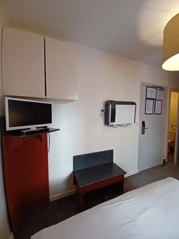 TV a/nebo společenská místnost v ubytování Hotel Koffieboontje