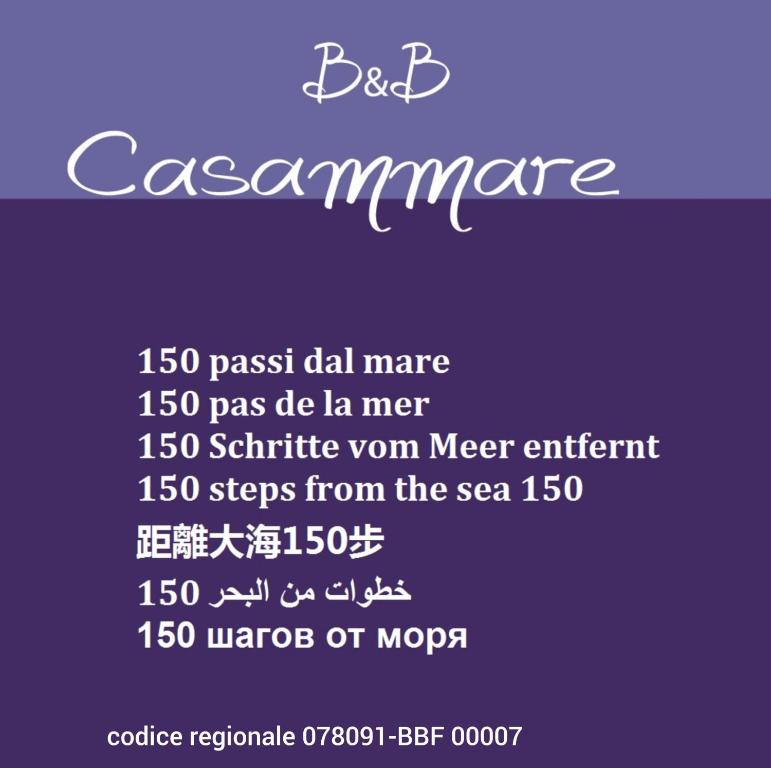 a sign for a bc examerate with a purple at casammare in Paola