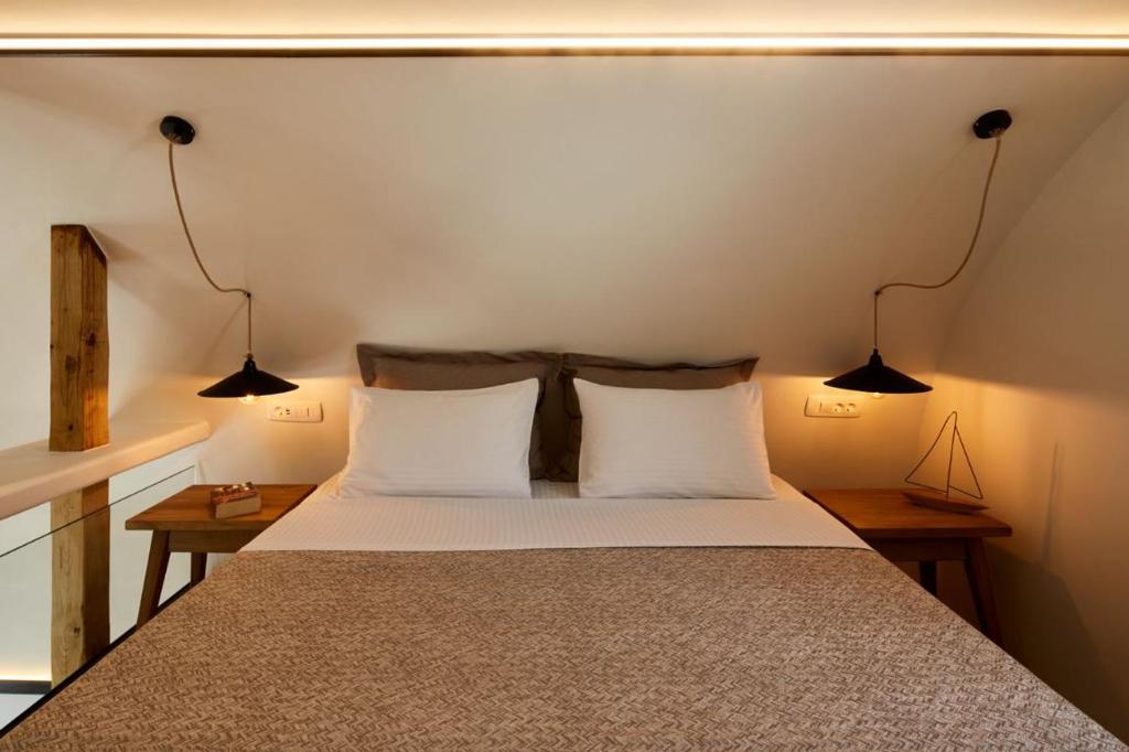 Кровать или кровати в номере Hermes Hotel
