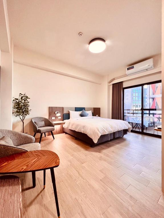 Voodi või voodid majutusasutuse 沛青日旅民宿 PQ Room toas