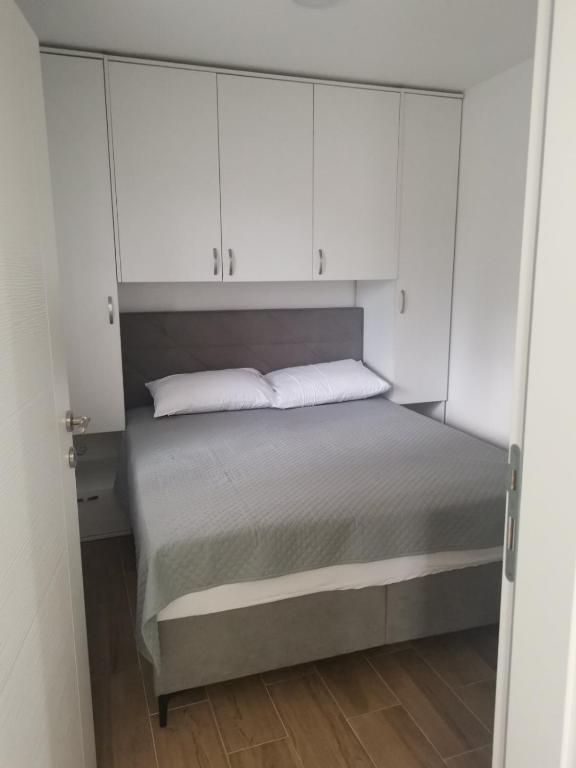 Postel nebo postele na pokoji v ubytování Spa Koncept-Apartmani