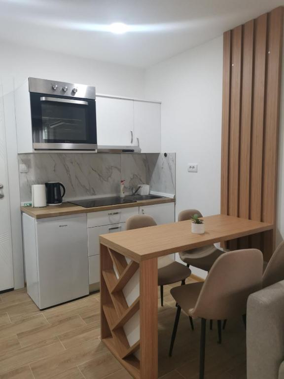 Kuchyň nebo kuchyňský kout v ubytování Spa Koncept-Apartmani