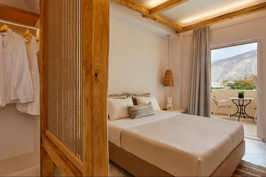 Кровать или кровати в номере Hermes Hotel
