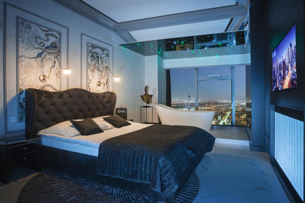 Posteľ alebo postele v izbe v ubytovaní In The Sky - Apartamenty w Sky Tower