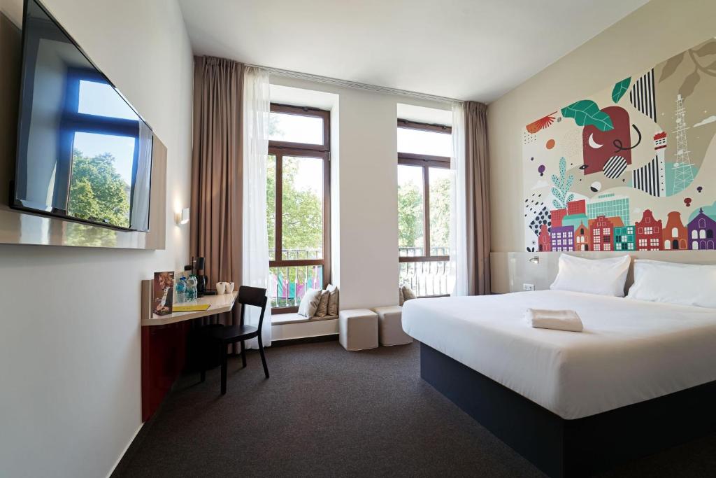 Posteľ alebo postele v izbe v ubytovaní B&B Hotel Poznań Old Town