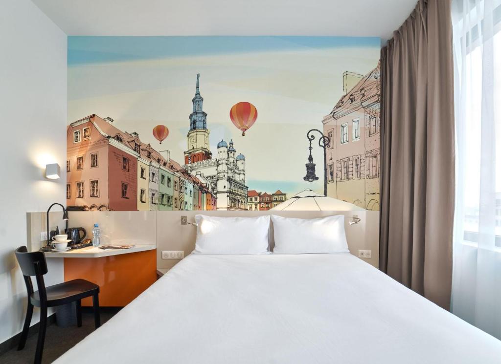 Posteľ alebo postele v izbe v ubytovaní B&B Hotel Poznań Old Town