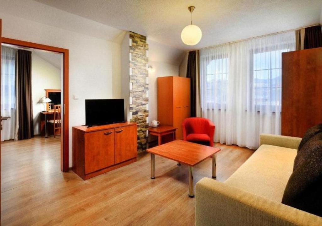 TV a/nebo společenská místnost v ubytování Hotel Bešeňová