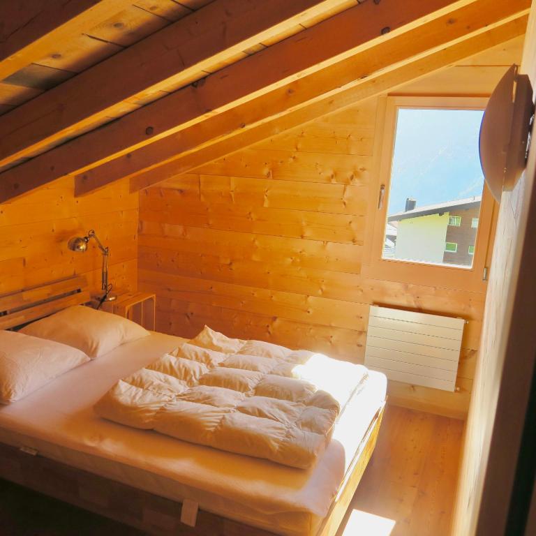 Postel nebo postele na pokoji v ubytování Casa Segnas