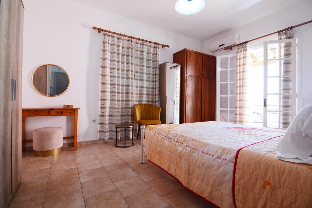 Postel nebo postele na pokoji v ubytování Stella's House Corfu