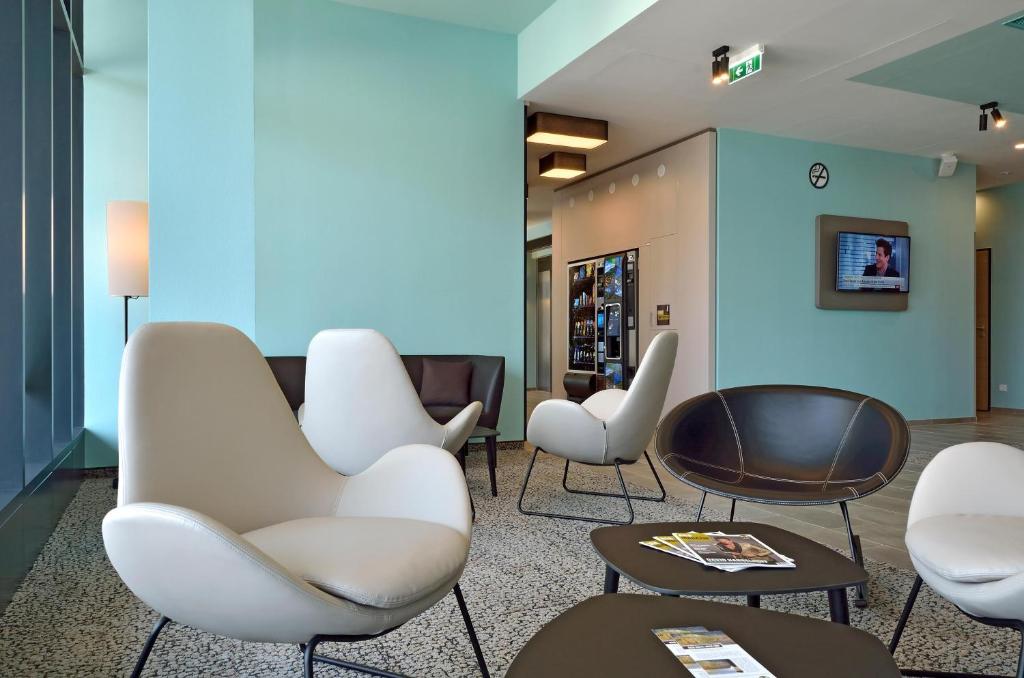 TV a/nebo společenská místnost v ubytování B&B Hotel Wien-Hbf