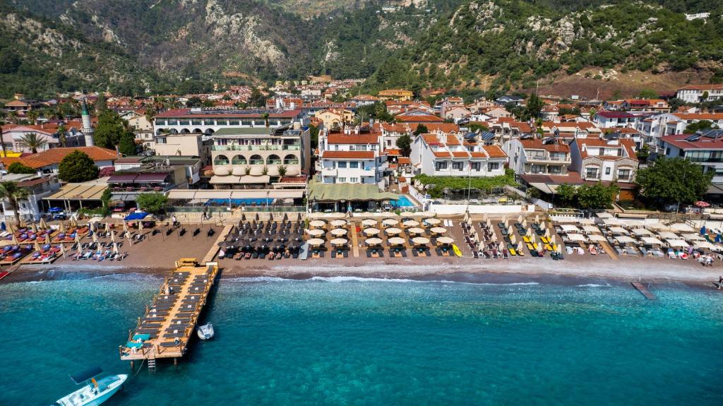 an aerial view of a beach with a town at Hotel Turunç-Malmen in Turunc