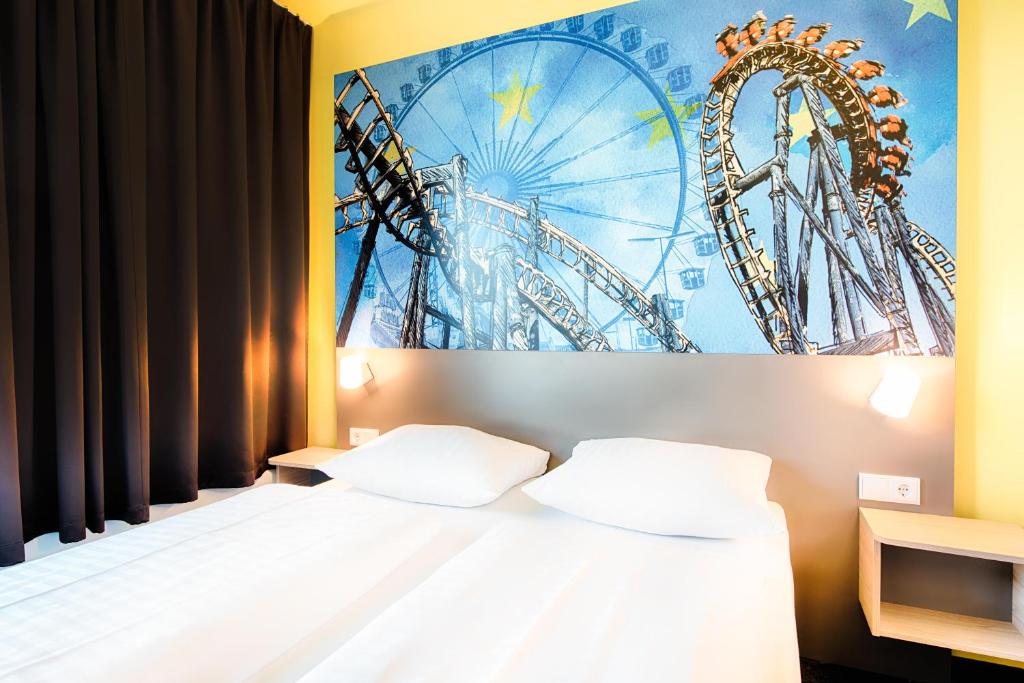 Postel nebo postele na pokoji v ubytování B&B Hotel Rust-Ettenheim