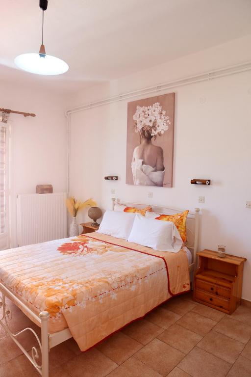 Postel nebo postele na pokoji v ubytování Stella's House Corfu