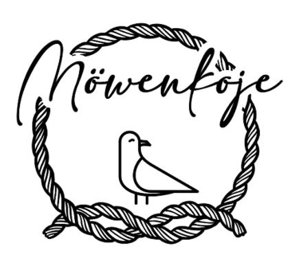 una carta de aventura con un pájaro en un marco de cuerda en Möwenkoje -klimatisiert- en Alsum