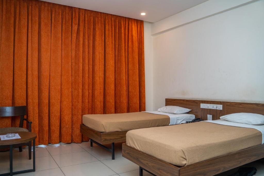 Postel nebo postele na pokoji v ubytování Hotel Dreamland