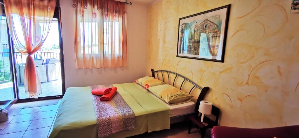 Postel nebo postele na pokoji v ubytování Studio Apartment Lela Ližnjan