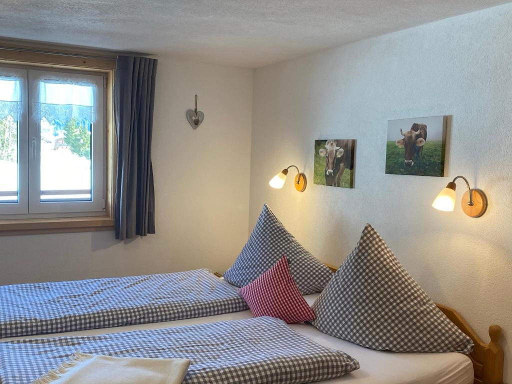 Postel nebo postele na pokoji v ubytování Gästehaus Nussbaumer