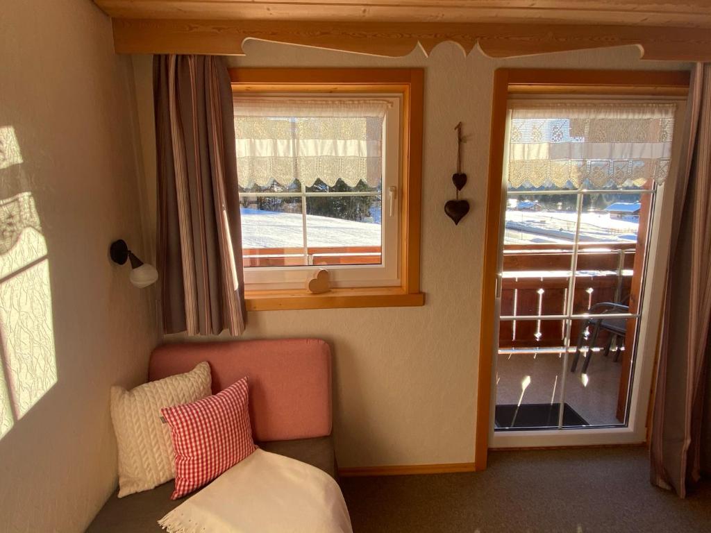 Postel nebo postele na pokoji v ubytování Gästehaus Nussbaumer