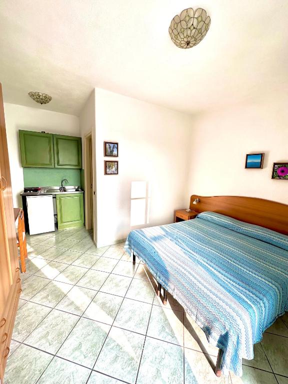 Postel nebo postele na pokoji v ubytování Casa Assunta