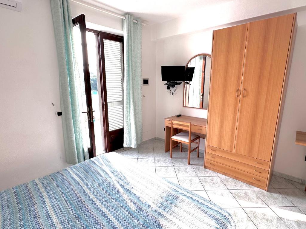 Postel nebo postele na pokoji v ubytování Casa Assunta