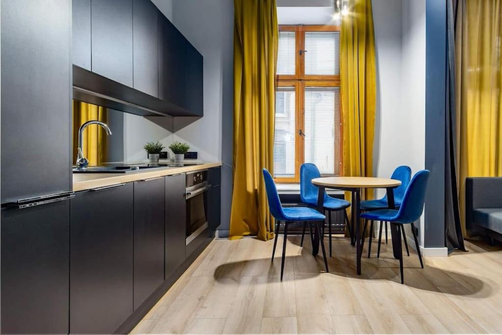 Una cocina o cocineta en Piotrkowska 92 Studio A