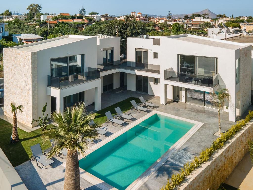 an aerial view of a house with a swimming pool at Jarko Luxury Houses in Argoulidhés