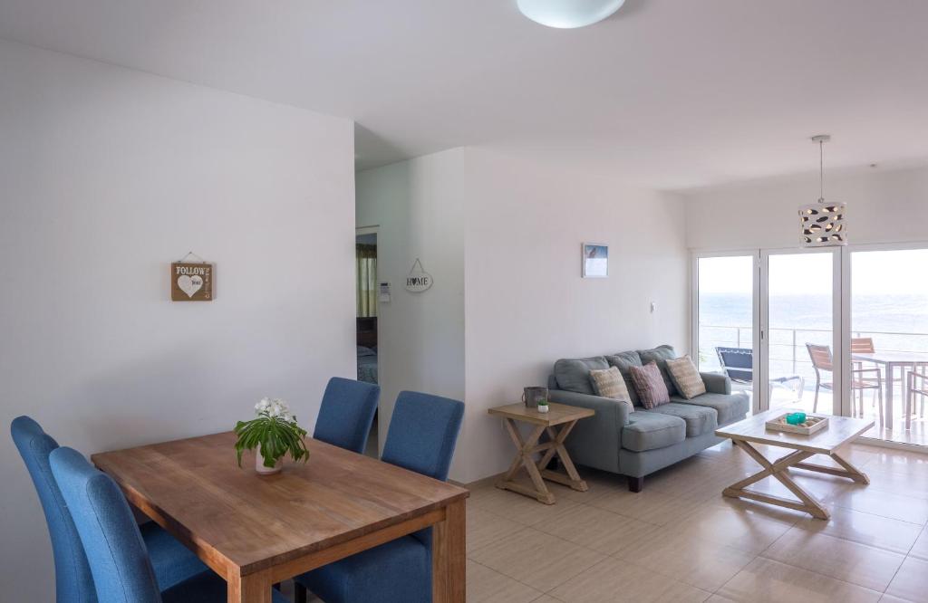 Ein Sitzbereich in der Unterkunft Whitehouse Lagun Apartments
