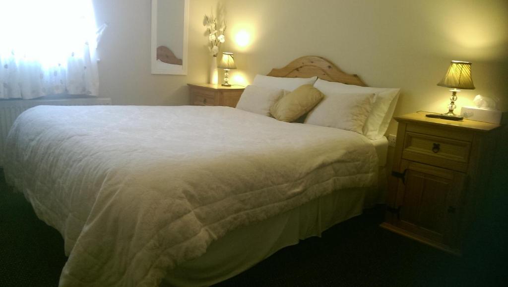 Postel nebo postele na pokoji v ubytování Suantrai Accommodation