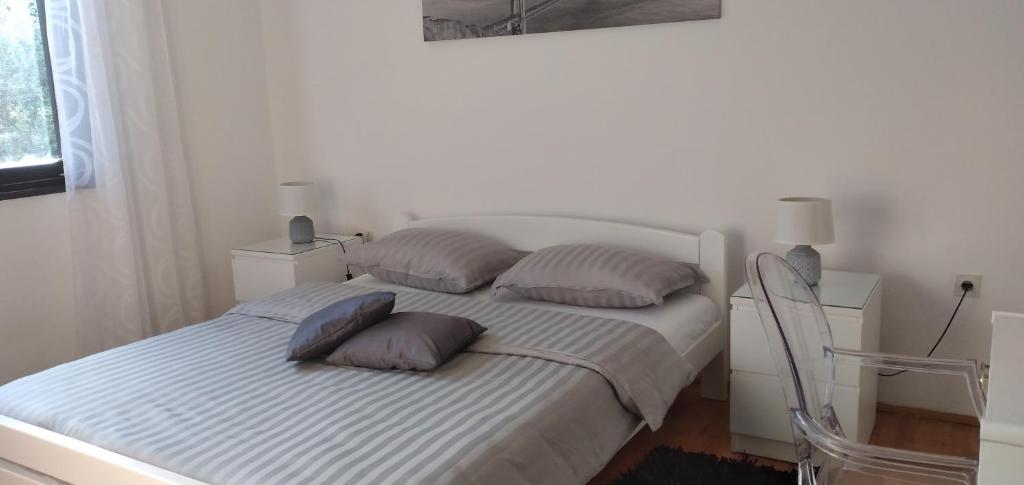 Postel nebo postele na pokoji v ubytování Apartment Greta
