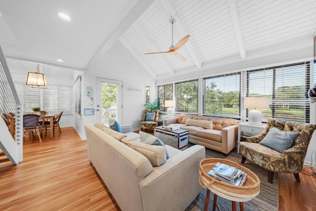 a living room with a couch and a table at 903 Sealoft Villa in Seabrook Island