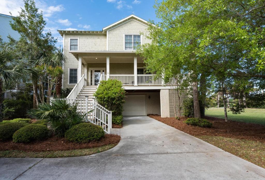 a house with a porch and a driveway at 2271 Seabrook Island Road in Seabrook Island