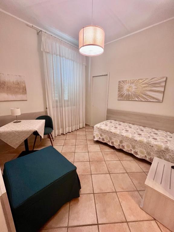 Postel nebo postele na pokoji v ubytování Albergo Africa