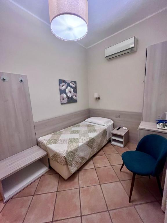 Postel nebo postele na pokoji v ubytování Albergo Africa