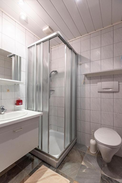 Koupelna v ubytování Landhaus MONTANA